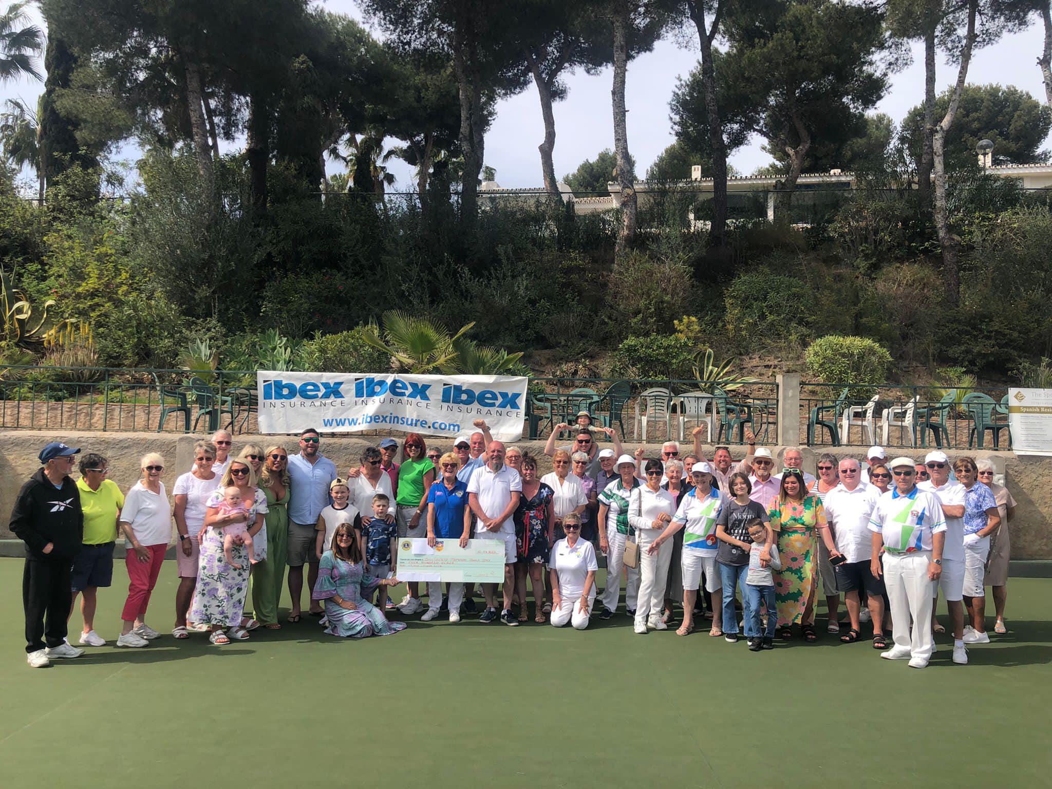 Club members gathered on the bowling green for a group photo